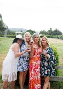 Four Women cheersing at Kaena Wine Club Event.